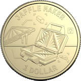 A gold-colored commemorative coin featuring an illustration of a jaffle maker, with the text 'JAFFLE MAKER' at the top and '1 DOLLAR' at the bottom.