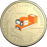 A gold-colored commemorative coin featuring an illustration of a black box flight recorder, with the text 'BLACK BOX FLIGHT RECORDER' around the edge and '1 DOLLAR' at the bottom.